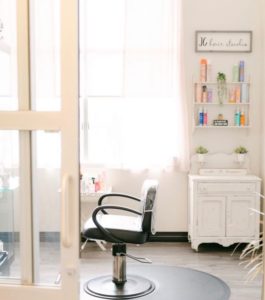 picture of the entrance into a suite and the salon chair