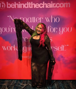 Mellissa Sawers posing at the behind the chair awards.