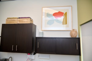 Artwork above her cabinets