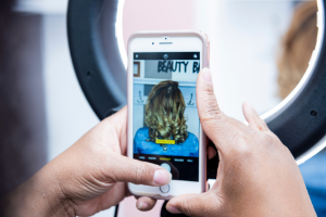 Picture of a phone taking a picture of hair
