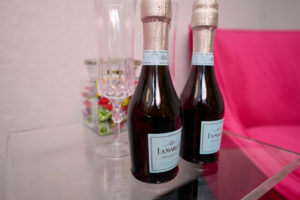 champagne bottles on a table in the suite