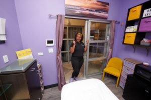 MY SALON Suite Member Darnisha looking surprised at her new suite