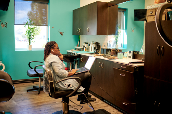 A member using their laptop in their suite.