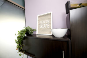 Follow Your Dreams Sign in purple suite