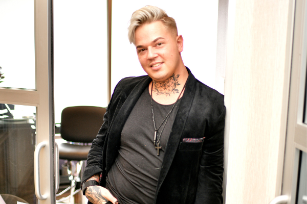 MY SALON Suite Member Josh Trotter standing in his suite door