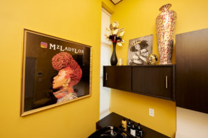 Latoya's branded sign for MzLadyLox salon