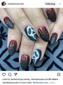 pictue of halloween nail art including bloody looking nails and a scream face