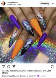 picture of purple and pink halloween themed nails