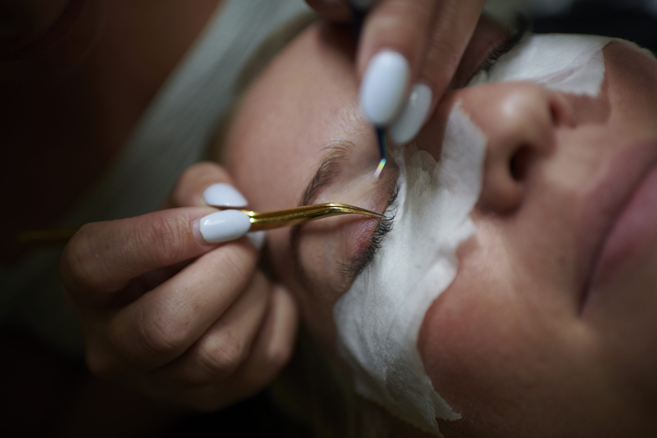 Eyelash tech performing a lash lift