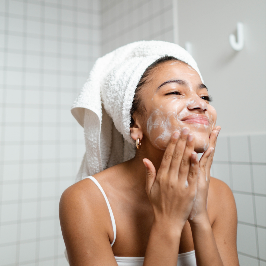 woman washing face