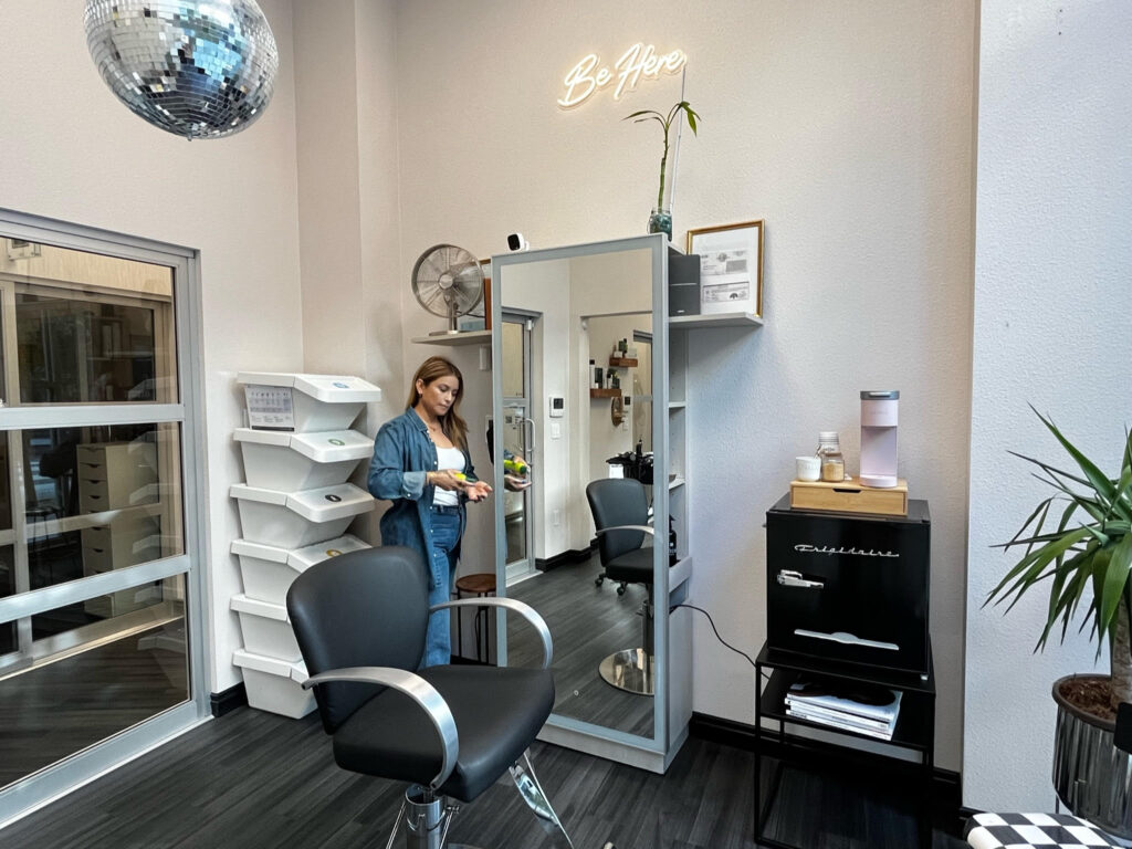 Vee running her Non Profit in her Suite at MY SALON Suite