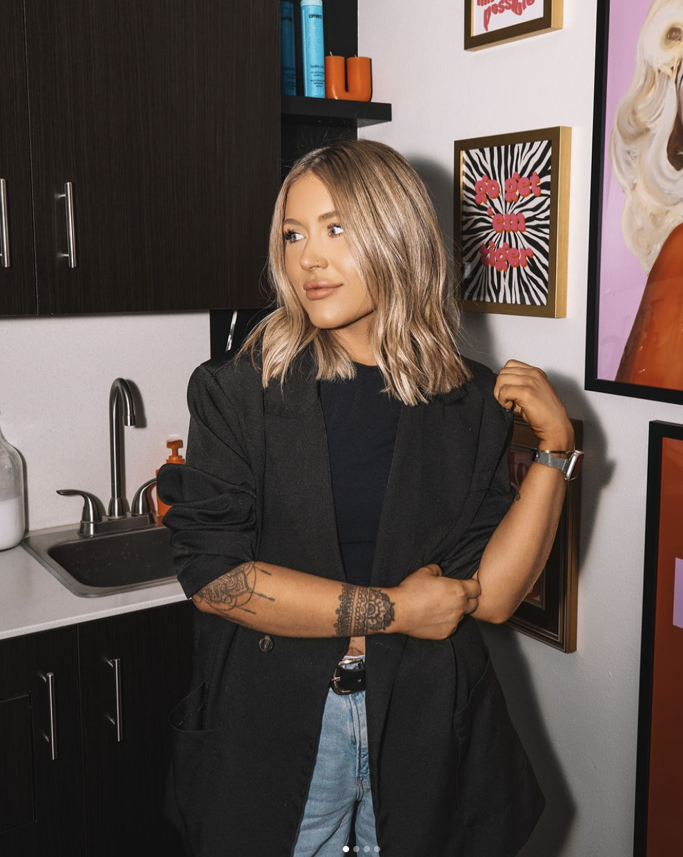 kaitlin parker standing in her suite in Midland Texas